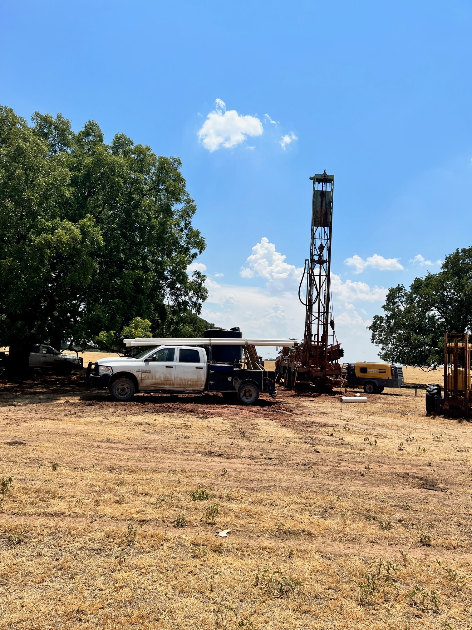 Drilling rig on summer job site